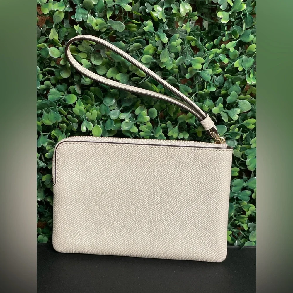 Coach - Small Corner Zip Wristlet in chalk crossgrain leather